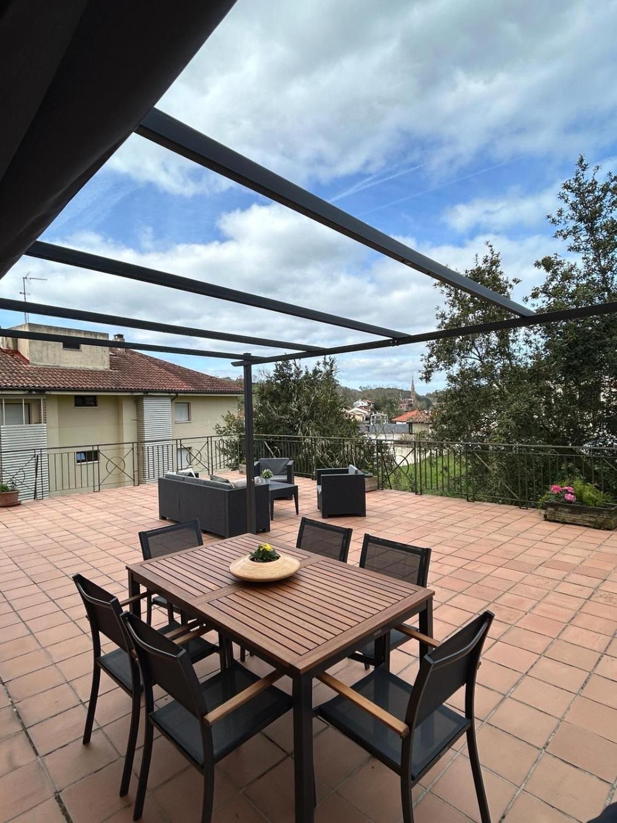 Апартаменты La Terraza Комильяс Экстерьер фото